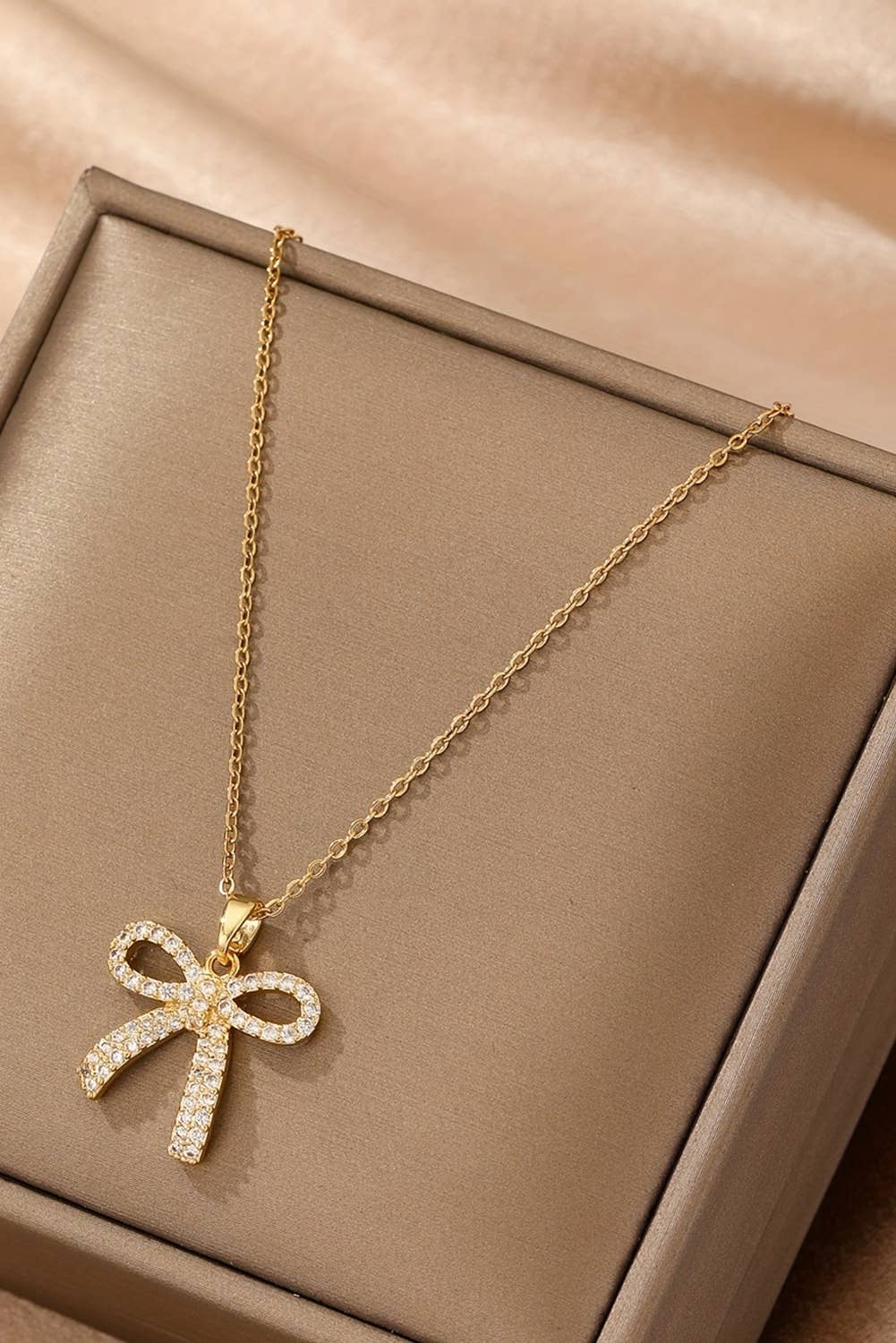 1  Plated Rhinestone Bowknot Pendant Necklace